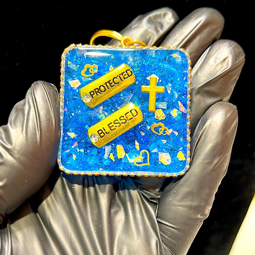 Resin keychain: “Protected + Blessed”